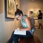 A Randolph College student studies in the Museum