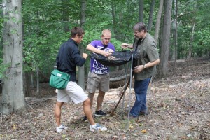 Dr. Ron Gettinger with ecology students, collecting samples of beech nuts.